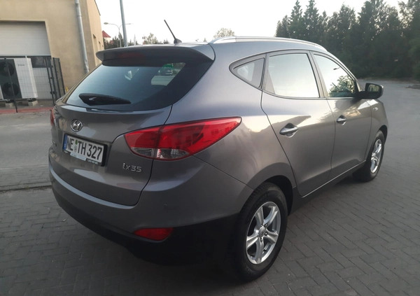 Hyundai Tucson cena 38500 przebieg: 155475, rok produkcji 2012 z Mrągowo małe 301